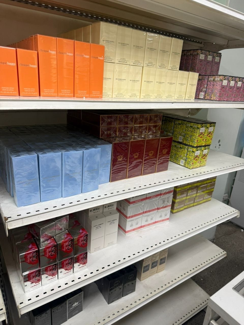 Boxed fragrances arranged within our stock area